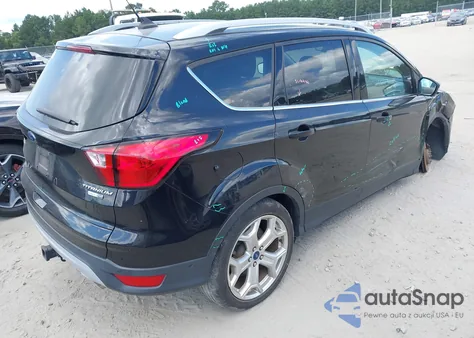 2019 Ford Escape Titanium z USA, uszkodzony, nr VIN 1FMCU9J96KUA29660